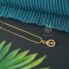 gold toned necklace with pendant