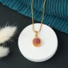 gold toned necklace with pendant